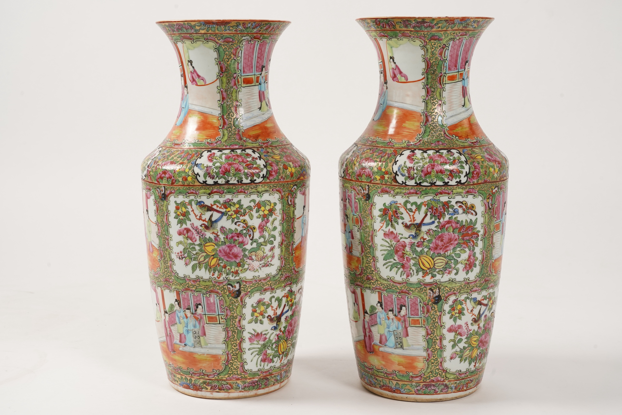 A pair of Chinese famille rose vases, 19th century